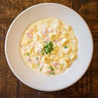 Tortellini · Cheese tortellini with ham and peas served with your choice of sauce. Served with sourdough ...