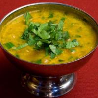 Lentil Soup · Delicately spiced lentil soup garnished with vegetables.