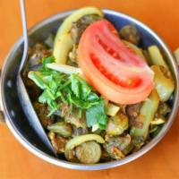Bhindi Bhaji · Fresh cut okra cooked with chopped onions, tomatoes and spices.