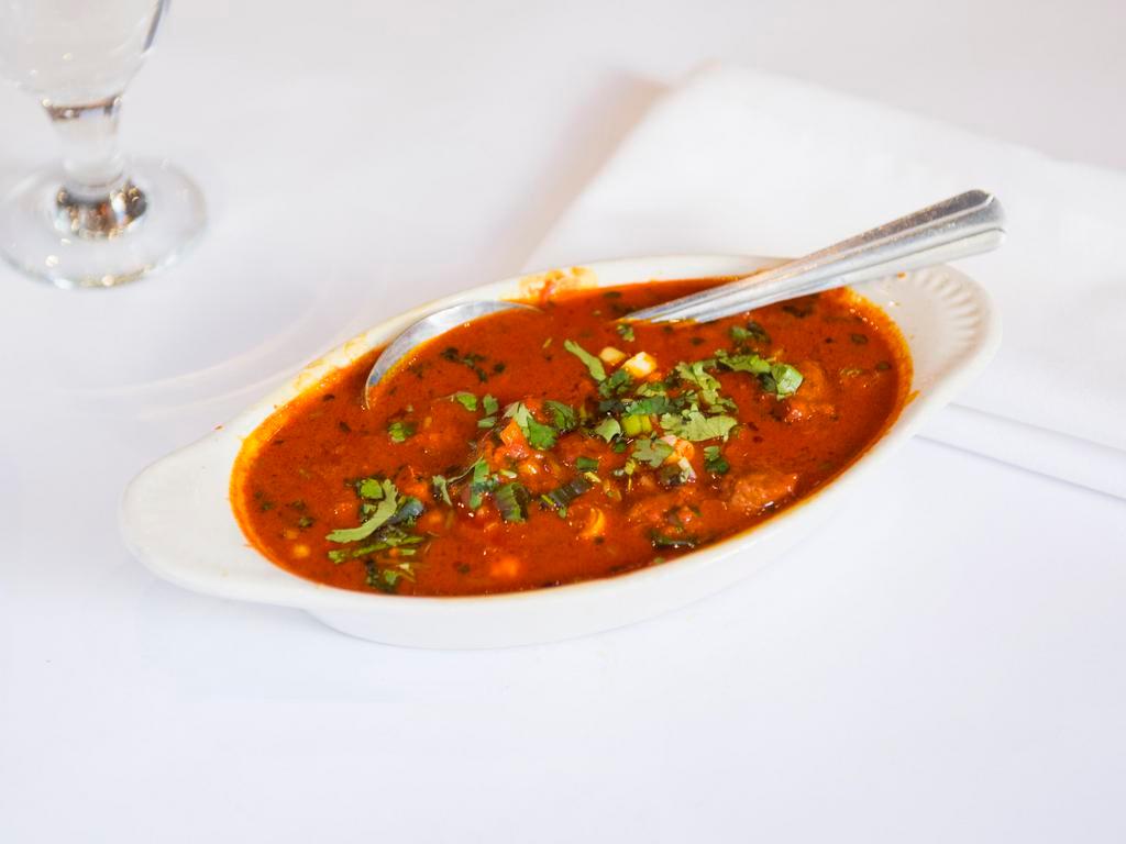 Rogan Josh · Classic lamb curry with garlic, ginger and onion gravy sauce.