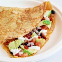 Southwest Veggie Crepe · Cheddar, black beans, tomato, red onion, avocado, garlic chilies and sour cream.