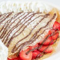 Creme de la Crepe · Strawberries, nutella and whipped cream, topped with powdered sugar.