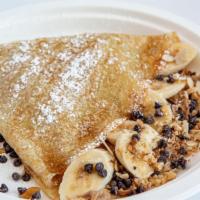 The Chunkster Crepe · Peanut butter, sliced banana, chocolate chips and mixed nuts, topped with powdered sugar and...