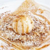 Not French Toast Crepe · Crepe topped with powdered sugar, cinnamon, crushed walnuts and vanilla ice cream drizzled w...