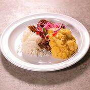 Chuletas de Puerco · Pork chops with mashed potatoes, creole salad and steamed garlic rice.