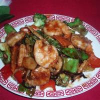 Large Jumbo Shrimp In Garlic Sauce · Served with white rice......spicy
