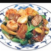 H2. Triple Delight · Beef,Jumbo shrimp, tender white meat chicken sauteed in garden vegetable in chef's brown sau...