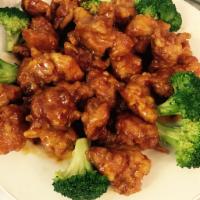 H5. General Tso's Chicken · Tender chunks of marinated boneless chicken sauteed in chef's red hot sauce. Served with bro...
