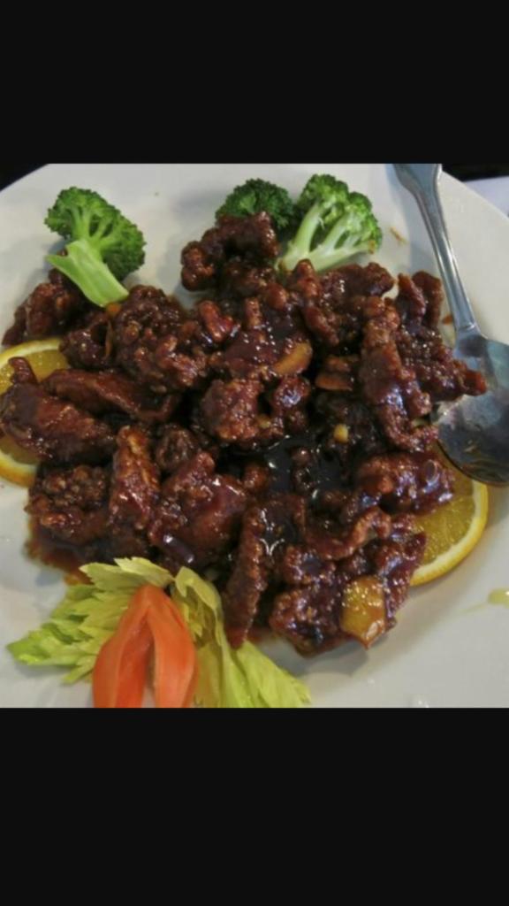 H16. Orange Flavored Beef · Crispy chunts of boneless beef sauteed with hot peppers and orange peef in a delicious special sauce. Served with white rice. Spicy.