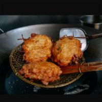 Vegetable Egg Foo Young · Served with white rice.