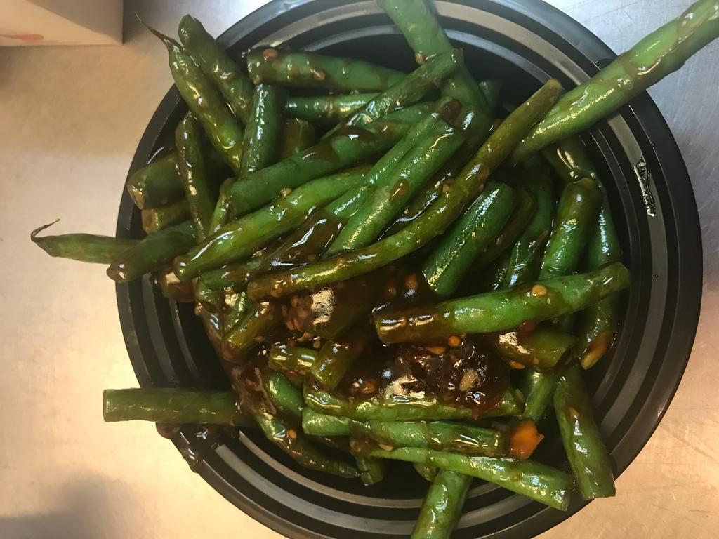 Large Sauteed String Bean in Garlic Sauce · Served with white rice.