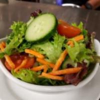 Mixed Green Salad · Mixed greens, cherry tomatoes, shaved carrots, cucumber, lemon vinaigrette 