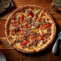 Beefer Sutherland Pizza · Italian beef, provolone cheese, Italian seasoning, and choice of hot giardiniera or sweet pe...