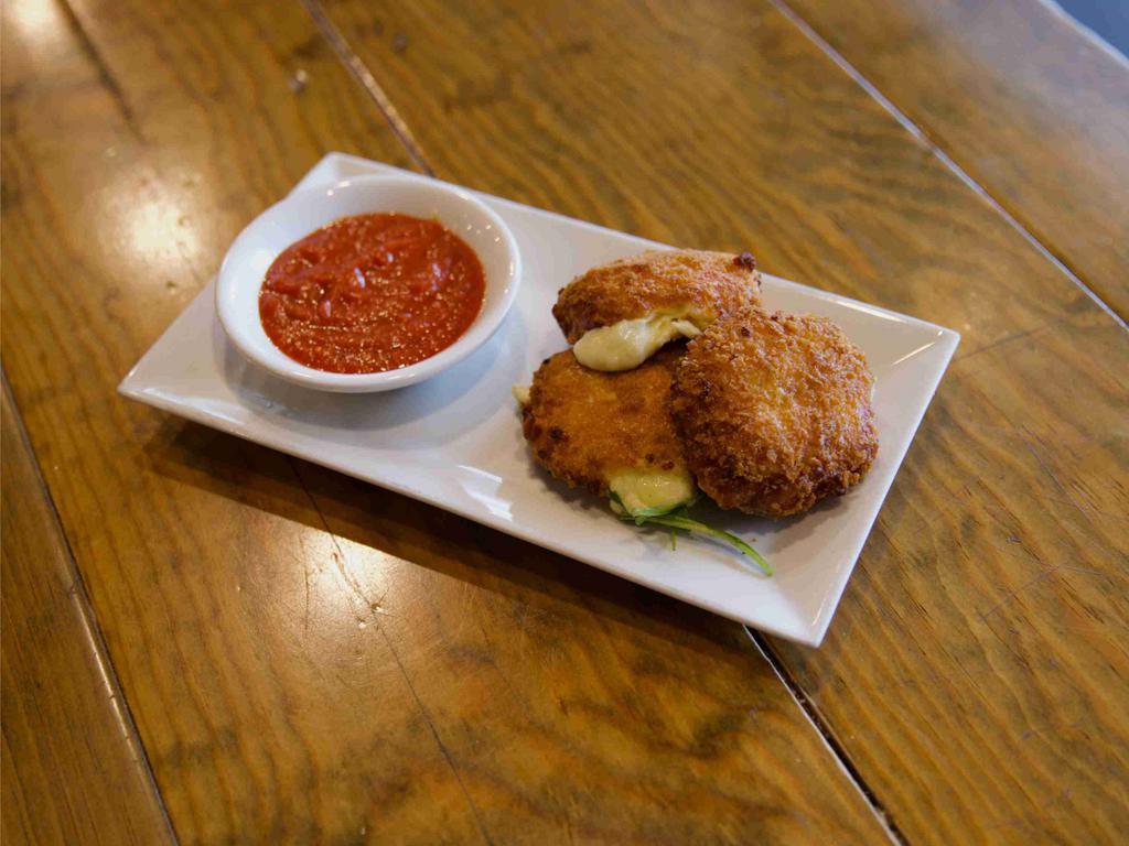 Fried Mozzarella · House-made and free-formed mozzarella, fried in panko crumbs.