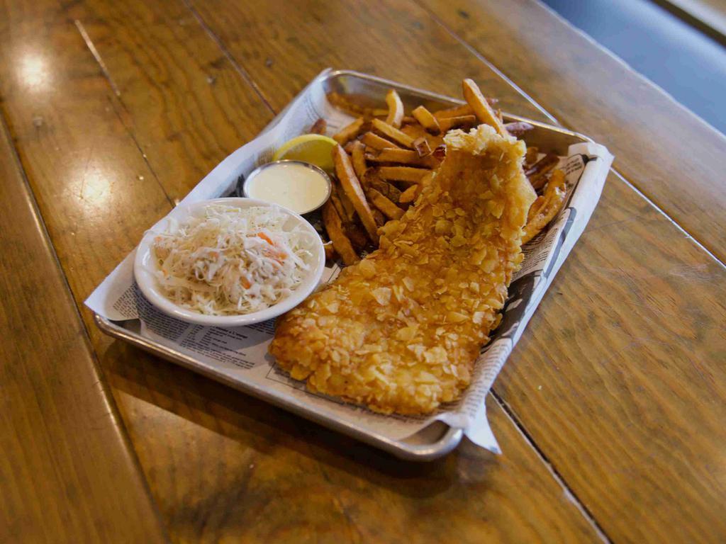 Fish and Chips · New England style, hand-cut french fries, homemade tartar and coleslaw.