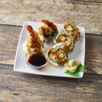 Shrimp Tempura Roll · Shrimp tempura, avocado and cucumber, topped with eel sauce.