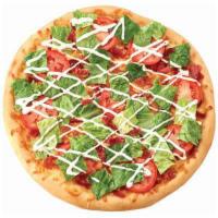 BLT Pizza · No sauce base, bacon, tomato and lettuce, drizzled with homemade ranch.