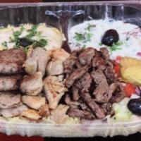 10. Tri-Meat Plate · Basmati rice, taziki, hummus, lettuce, tomato, onions, parsley.