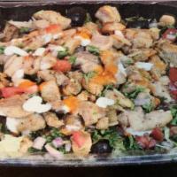 13. Chicken Doner Salad · Feta cheese, taziki, hummus, lettuce, tomato, onions, parsley.