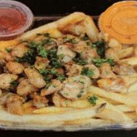 18. Chicken Doner Fries · Feta cheese, fries, parsley.