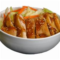 Chicken Teriyaki · Tender slices of Chicken Topped with Teriyaki Sauce, Steamed Mixed Vegetables & Sesame Seeds...