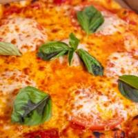 Classic Margherita Pizza · San Marzano tomato, fresh mozzarella, and basil.