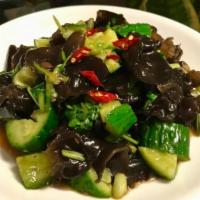 Cucumber & Woodears Salad 醋溜黄瓜木耳片 · Julienne bell peppers and onions and garnished with fresh bird's eye chilis mixed in house v...