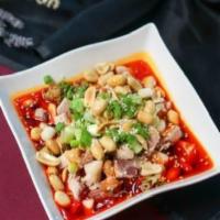 Mouthwatering Chicken 重庆無骨口水鸡 · Poached boneless chicken, roasted peanuts, sesame seeds, smothered in a spicy chili dressing.