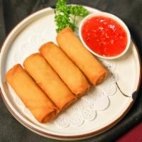 Vegetarian Spring Roll 黃金春卷 · Crispy rolls stuffed with julienned veggies and served with sweet chili dipping sauce