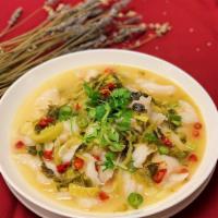 Fish Fillet in Sauerkraut Broth 酸菜鱼片 · Bean sprouts, glass noodles, hot & spicy sauerkraut broth