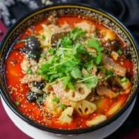 Maocai 什锦冒菜 · A mix of cauliflower, woodears, scallop potatoes, lotus root, pork intestines, spam & beef a...