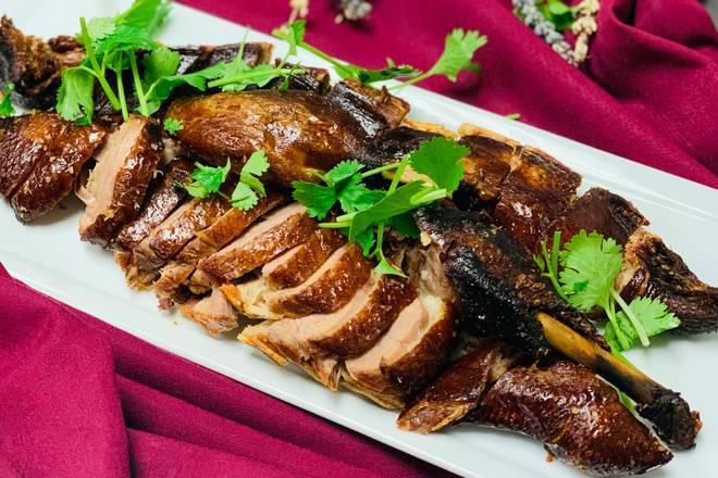 Tea Smoked Duck 樟茶鸭  · House Marinate with chef's special spices & hot smoked over tea leaves 
