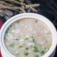 West Lake Beef Soup 西湖牛肉羹 · Minced beef, chopped cilantro & whisked egg whites in a rich bone broth.
