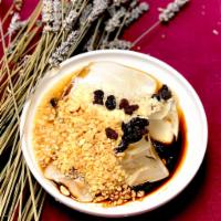 Raindrop Jelly 乐山冰粉 · Topped with ground peanuts, raisin & fermented sweet rice