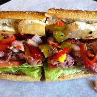 Roast Beef Brie Roasted Red Peppers Sandwich  · Sandwich with thinly sliced beef that has been cooked over a dry heat. 