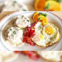 Biscuits and Gravy · 2 house made biscuits, sausage gravy and 2 eggs any style.