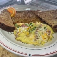 Denver Omelette · Ham, bell peppers, onions, Mexican cheese blend, choice of toast, breakfast potatoes or hash...