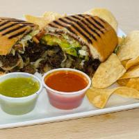Torta · Your Choice of Meat Topped with Pinto Beans, Mayo, Lettuce, Onion, Avocado, and Jalapeno. Me...