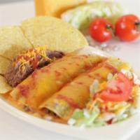 Enchilada Platter · Two Taco Meat Enchiladas , side of refried beans and a salad.