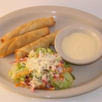Tacos Fritos de Carne o Pollo · Fried chicken or Beef tacos. Served with salad and sour cream.