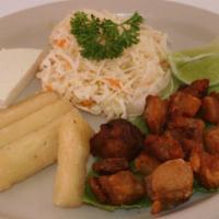 Yuca Frita con Chicharron · Served with pork fried with cabbage and fresh cheese.
