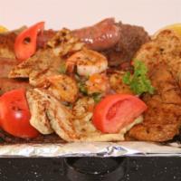 Parrillada Para 1 · Beef, flanken ribs, grilled pork, chicken, beef sausage, blood sausage, shrimps. Servidos co...