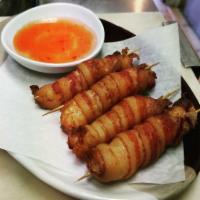 A12. Bacon Shrimp Roll · Deep-fried shrimp wrapped with bacon. 