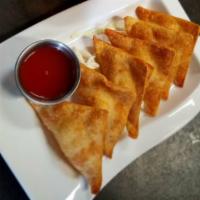 6 Piece Cream Cheese Wontons · Fried wontons stuffed with cream cheese, served with sweet and sour sauce.