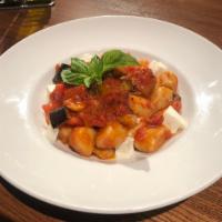 Gnocchi alla Baba · plum tomato, basil, garlic, mozzarella, & roasted eggplant