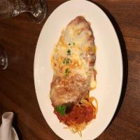 Chicken Parmigiana · breaded chicken cutlet topped with marinara sauce and melted mozzarella