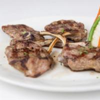 American Lamb Chops · Grilled and seasoned with rosemary & garlic