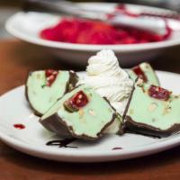 Tartufo · Choice of vanilla & chocolate or pistachio gelato encased in a chocolate shell with cherry &...