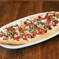 Greco Roman Flatbread · The Opa! Version of bruschetta: grilled homemade pita bread topped with famous tzatziki, hei...