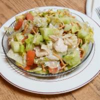 Chinese Chicken Salad · Contains Slines of Chicken Breast, Wontons, Cucumber,  Tomato,  Finely chopped onion, Parsle...